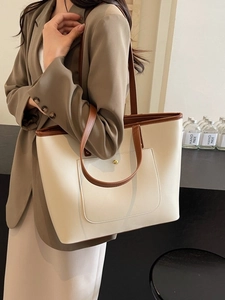 Minimalist cream and brown large capacity tote bag with elegant golden buckle detail