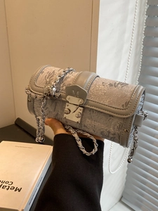 Elegant grey cylinder chain bag with floral relief and silver metal ball charm
