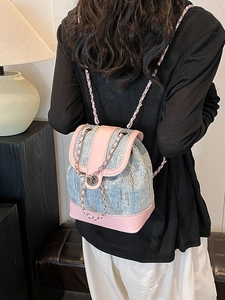 Pink and blue sequin mini bucket backpack with chain straps and metal twist lock