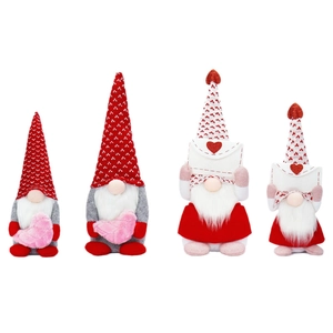 Set of four Valentines Day gnomes in red and white knit hats holding love heart envelopes