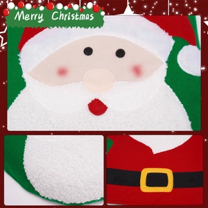 Close-up of Santa Claus Christmas stocking with soft white plush fabric and embroidery