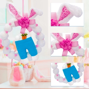 Close-up of Easter rabbit wreath with plush pom-poms, bunny ears and carrot charms