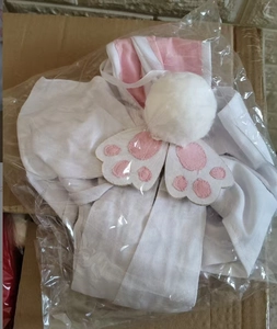 Close-up of Easter rabbit plush ornament with pink paw embroidery and soft white pom-pom