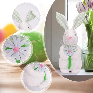 Detail showing white plush Easter bunny ears and checkered scarf with a felt daisy