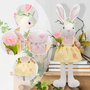 Lapin de Pâques en peluche avec robe jaune et fleur pour décoration de fête