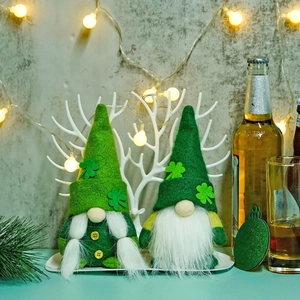 St. Patrick's Day gnomes with green hats and clover details on a festive background