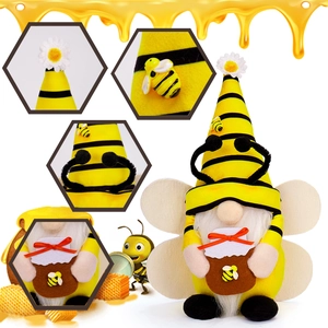 Detailed views of handmade bee gnome with yellow stripes holding a honey jar and daisy