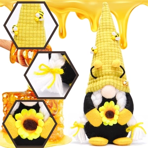 Detail of bee gnome featuring waffle texture hat, faux braids, and sunflower ornament