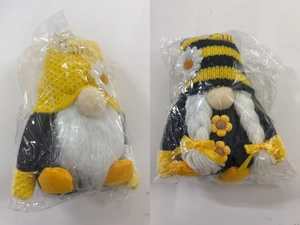 Detail of bee gnomes with sunflower and striped knit hats on a white background