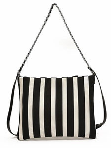 Striped canvas shoulder bag with black and white vertical patterns and silver chain strap