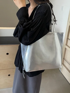 Minimalist silver contrast large tote bag with metallic leather and tassel zipper detail