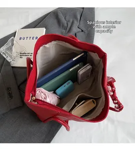 Top view of red lychee grain tote bag showing spacious interior with zipper pockets