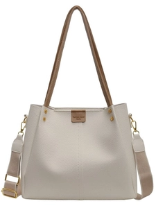 Off-white large capacity leather tote bag with wide shoulder strap and gold hardware
