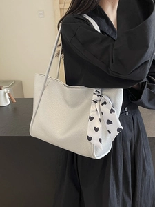 Large off-white pebbled leather tote bag for women with a heart-patterned silk scarf accessory