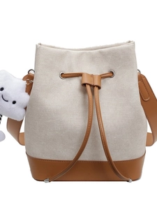 Fashionable canvas bucket bag with brown leather trim and cute cloud pendant charm