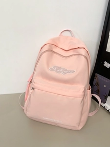 Zaino scolastico rosa chiaro capiente con ricamo sportivo dal design minimalista