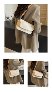 Three-way view of beige patterned flap bag with brown leather strap and silver buckle