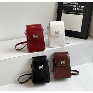 Mini glossy crossbody phone bags in four colors with silver butterfly metallic accents