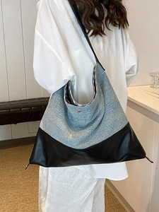 Large blue denim and black PU leather patchwork tote bag with long shoulder straps