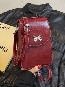 Retro deep red crossbody phone bag with glossy leather and silver butterfly ornament