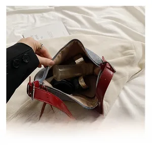 Interior view of the grey canvas bag showing ample space for makeup and daily items