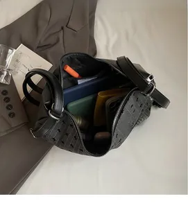 Interior view of spacious tote bag showing large capacity for essentials and zip pocket