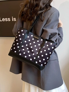 Polka dot large tote bag for women with black leather straps and shoulder carry style