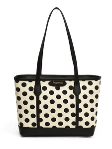 Stylish large tote bag featuring black and white polka dots with black shoulder straps