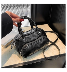 Black wrinkled leather mini crossbody bag with double zip pockets and top handles