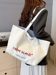 Large capacity off-white canvas tote bag with French text and blue striped lining