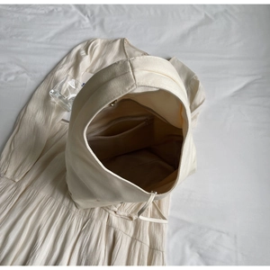Top view of large capacity cream canvas tote bag interior with secure zipper pocket