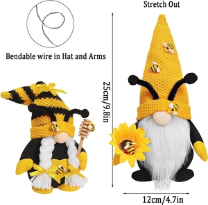 Detailed view of handmade bee festival gnomes with sunflower and honey wand accessories