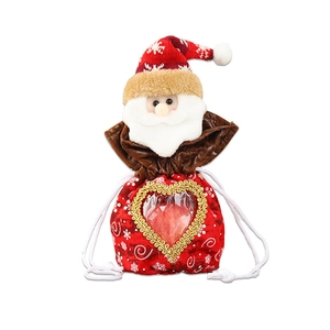 Detail of Christmas Santa drawstring gift bag with heart transparent window and plush texture
