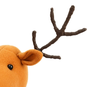 Detail of soft orange plush fabric and dark brown reindeer antlers on Christmas deer doll