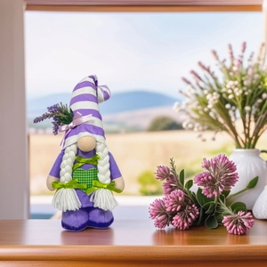 Detailed close-up of a purple gnome doll with striped hat and lavender on a wooden windowsill