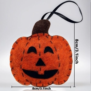 Detail of 8cm Halloween pumpkin felt ornament with stitched Jack-o'-lantern face and ribbon