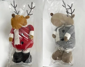 Close-up of telescopic Christmas reindeer plush toys in red and grey holiday outfits