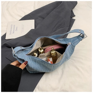 Interior view of denim hobo bag showing spacious capacity for daily essentials