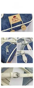Dettaglio borsa a bauletto in denim con manico in pelle bianca e minuterie in metallo