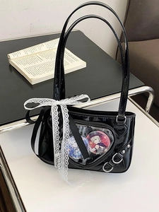 Glossy black heart-shaped ita bag with lace details and clear display window