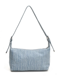 Light blue denim shoulder bag with silver hardware and adjustable strap on white background