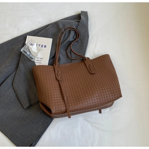 Brown woven PU leather tote bag with checkerboard texture and dual shoulder straps