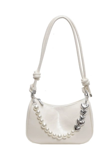 Minimalist cream white leather underarm bag with pearl heart chain and knot detail