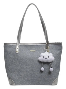 Gray canvas tote bag with silver leather trim and a cute cloud plush charm attached