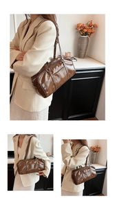 Detail showing glossy brown PU leather tote bag with dual handles and metal zipper finish