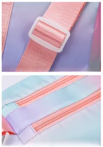 Detail of gradient travel bag featuring adjustable nylon strap and smooth metal zipper