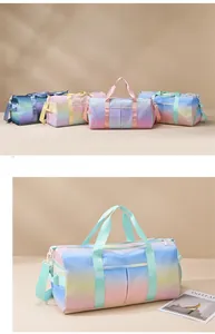 Close-up of rainbow gradient travel bag featuring separate shoe compartment and multiple pockets