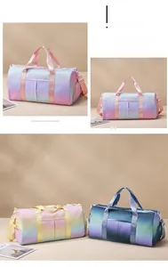 Three gradient colored waterproof nylon travel bags in pink, yellow, and blue hues