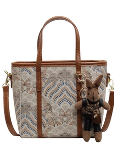 Chic beige jacquard tote bag with traditional cloud patterns and brown rabbit charm