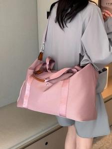 Pink large capacity Oxford fabric travel bag with adjustable strap and leather accents